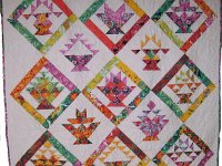 U3A014  2014 Jelly Roll quilt made by Susan Price & quilted by Stitch in Time Quilting